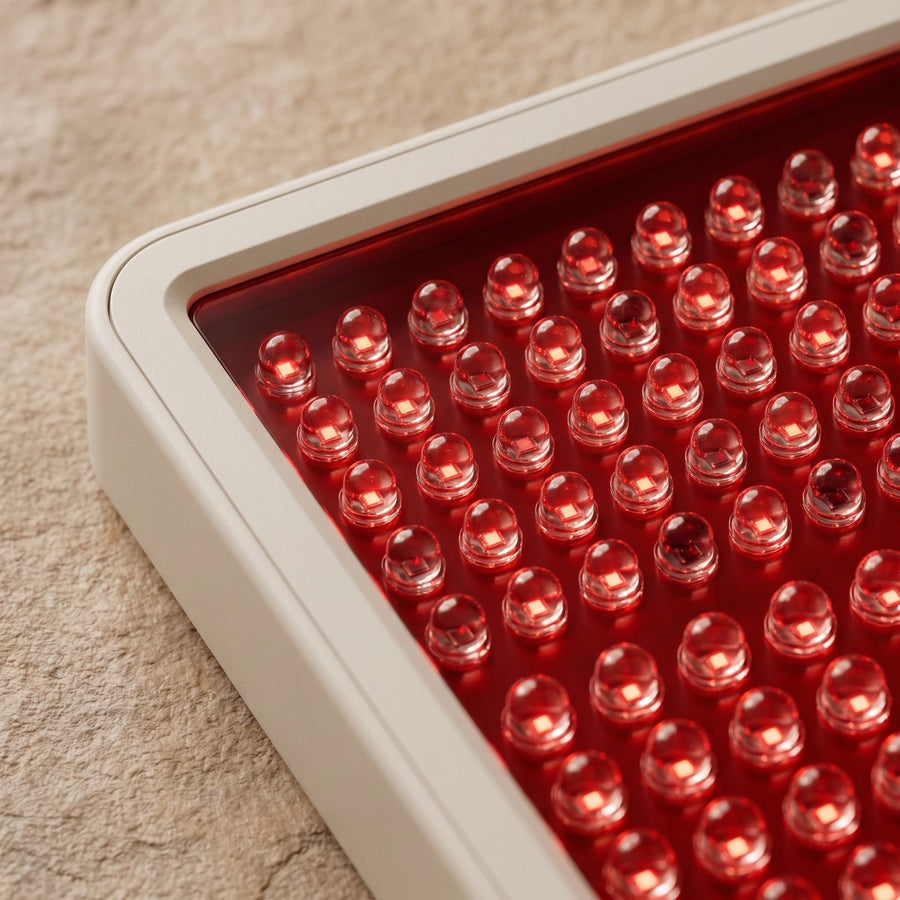 Close-up of the lenses in Dual mode: in each, one red chip lit and one near-infrared chip dim