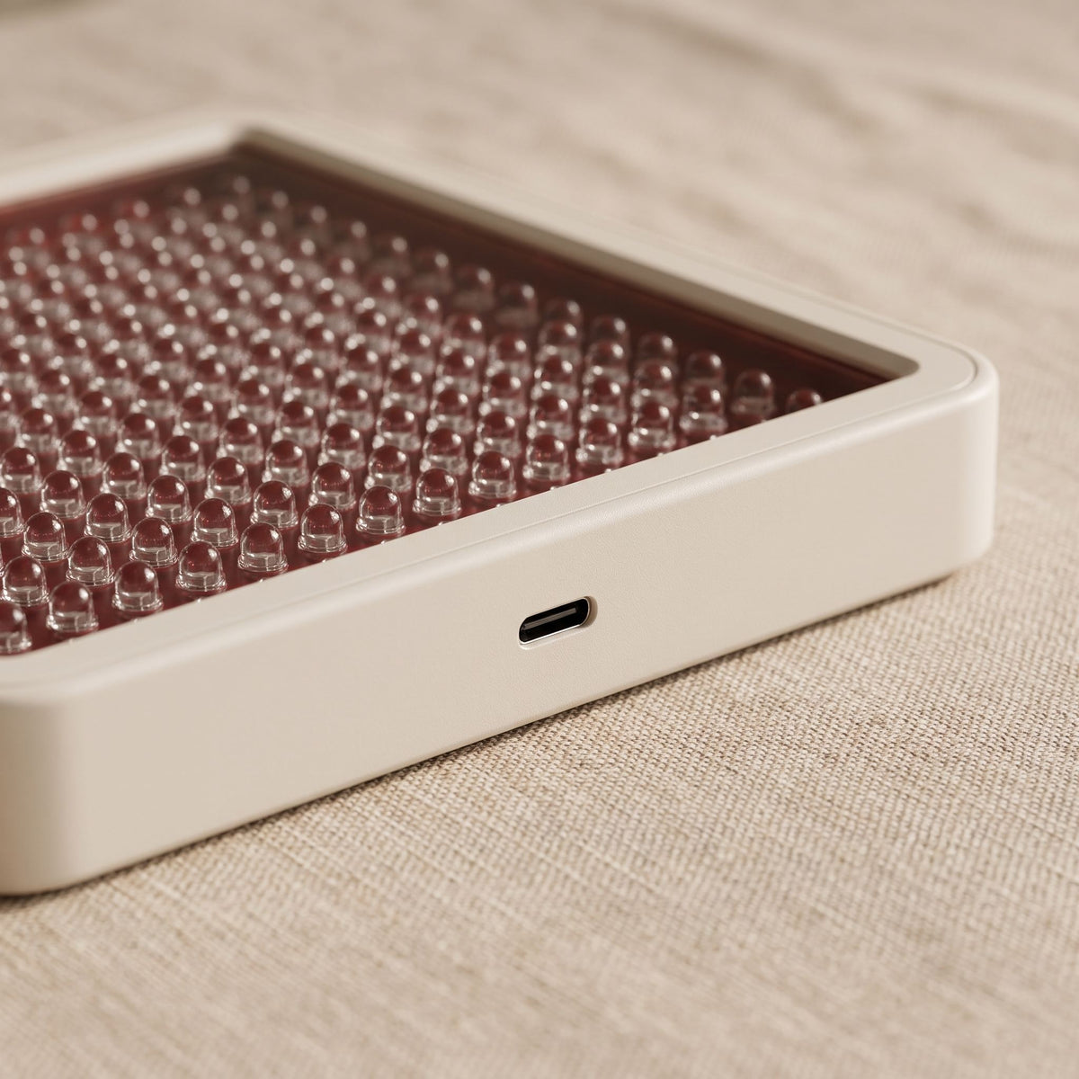 Folliq Portable Face Panel charging over USB-C