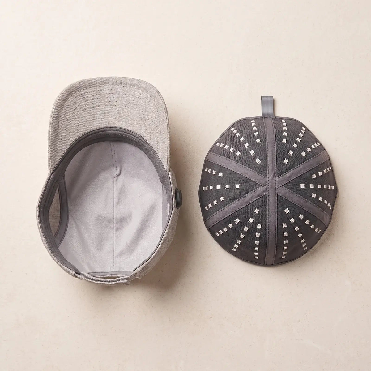 Folliq cap next to its removable LED insert