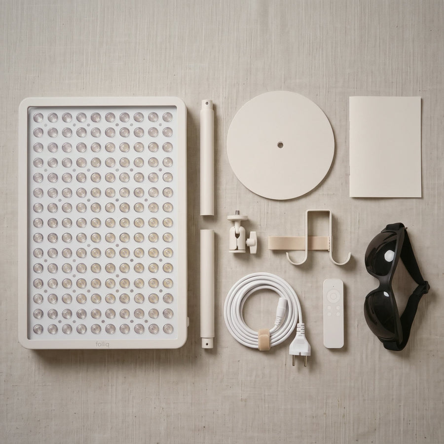What's in The Panel set: Folliq Red Light Therapy Panel on its floor stand, over-door kit, blackout goggles and remote