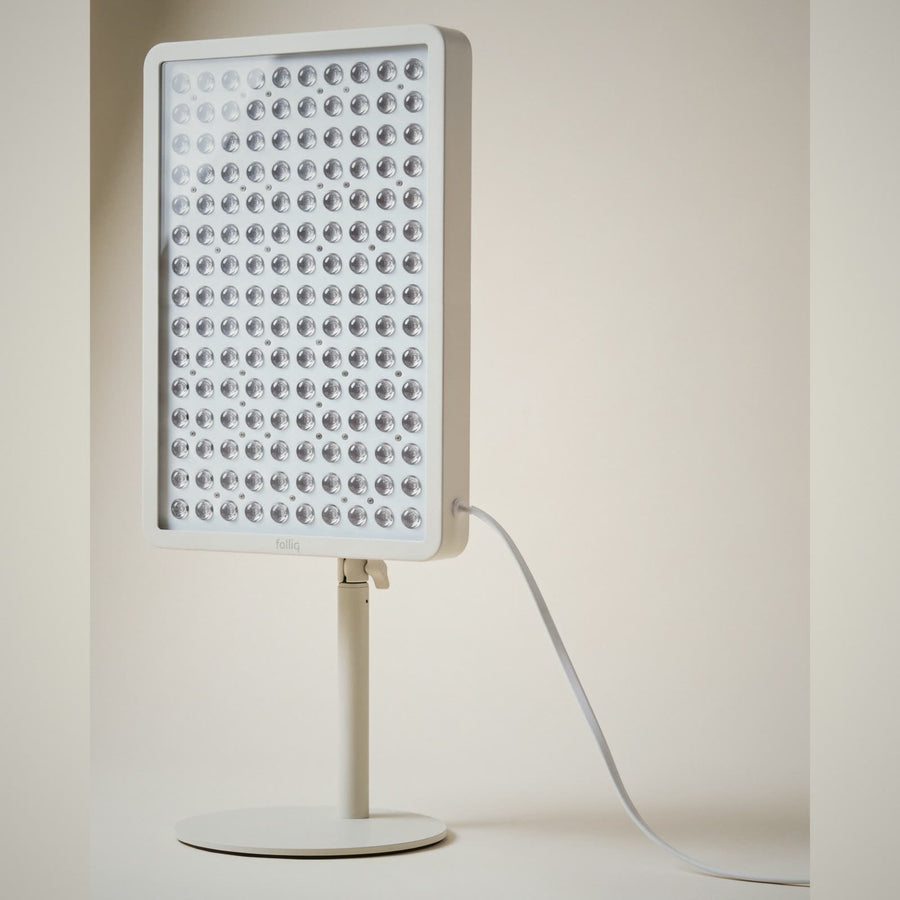 Folliq Red Light Therapy Panel on its floor stand, 48 × 30 cm